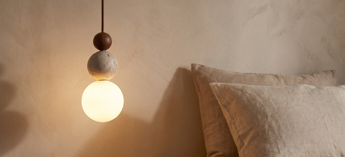 Bexley pendant hanging beside a bed