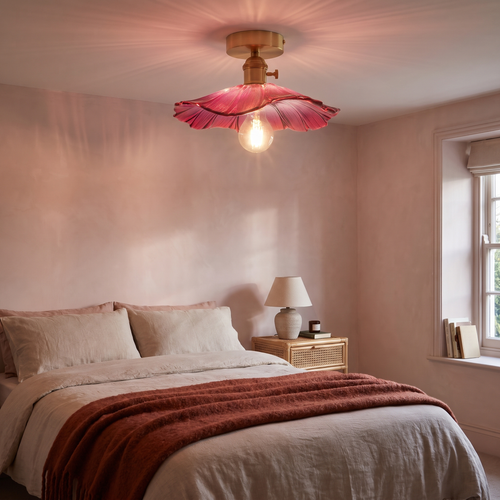 A wide raspberry pink Benhall ceiling light lit in a calm pink bedroom