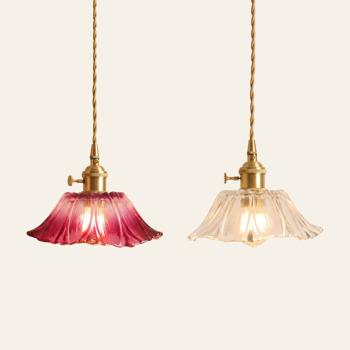 Benhall sunflower glass pendants in raspberry and clear side by side