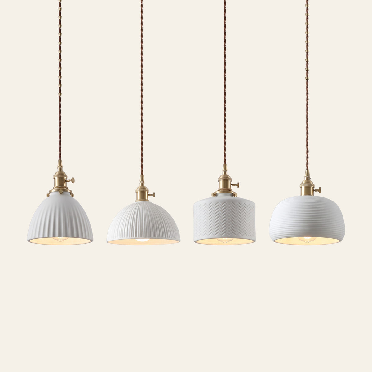 The Brantham white ceramic pendant light in its four shapes side by side