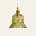 Cratfield pressed glass bell pendant light in green with a diamond pattern and brass switch holder, cream background