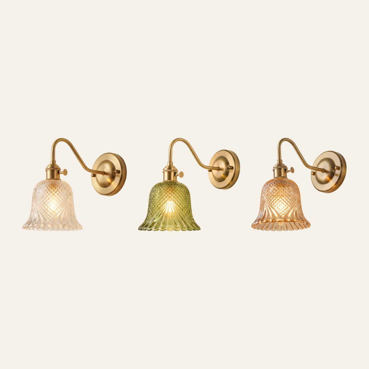 Dunwich diamond cut glass wall light in clear, green and amber glass side by side