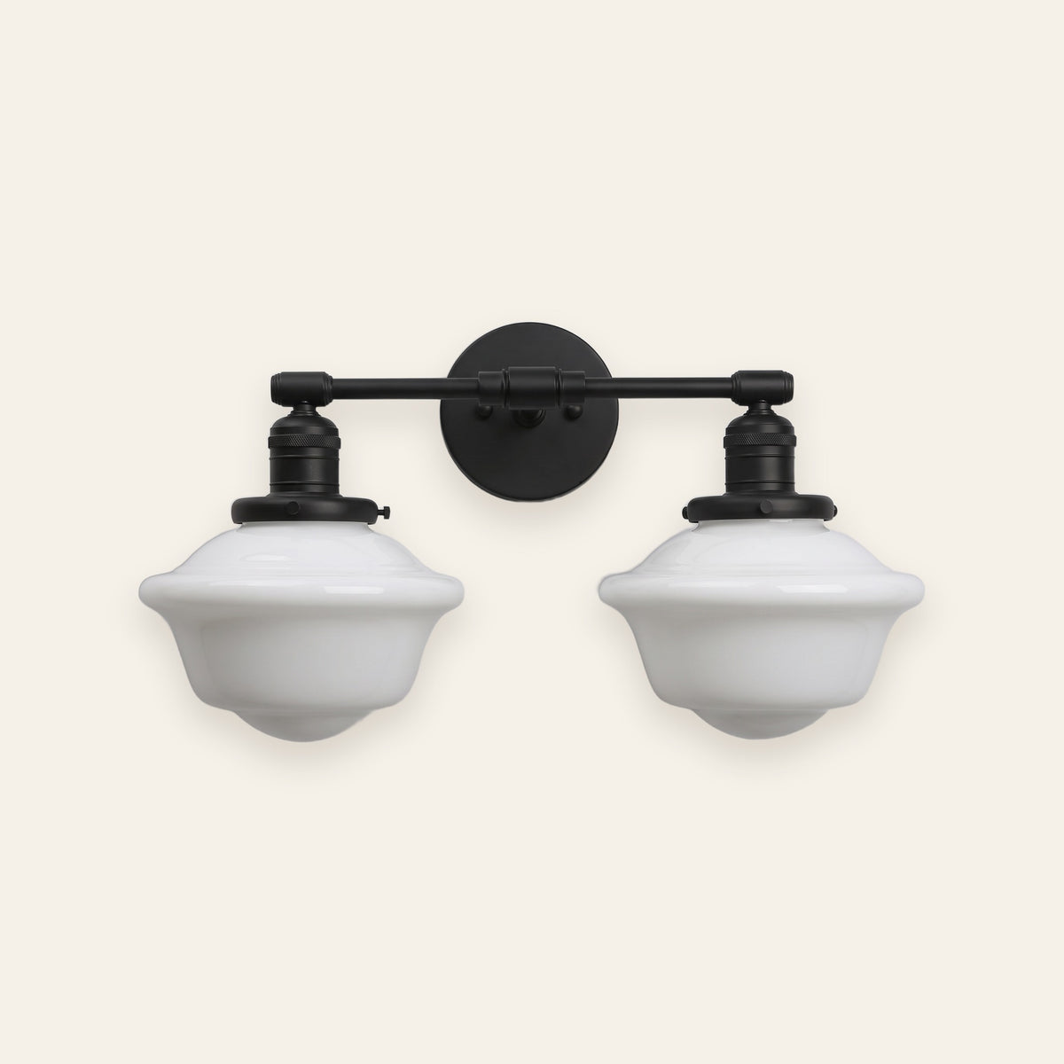 Ely two light milk glass vanity light in black on a cream background