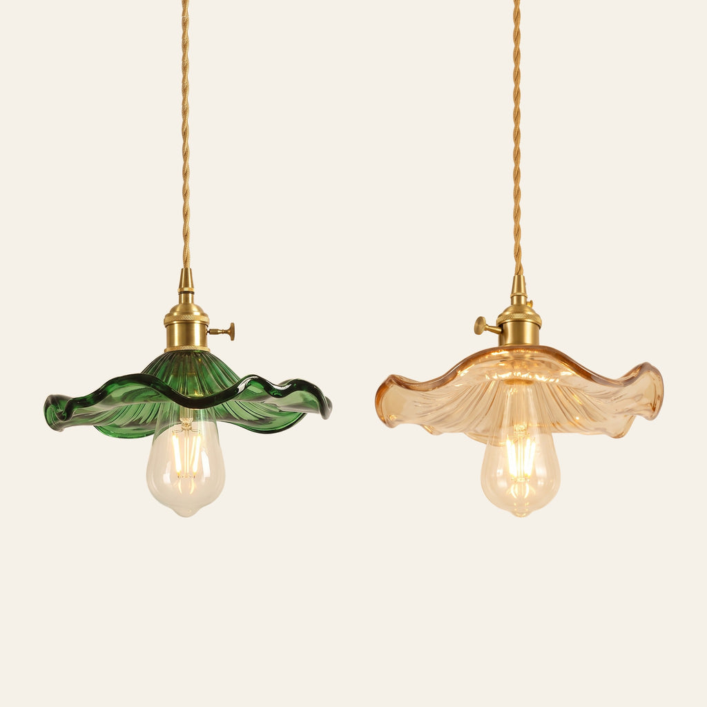 Framlingham lotus leaf glass pendant lights in green and amber side by side