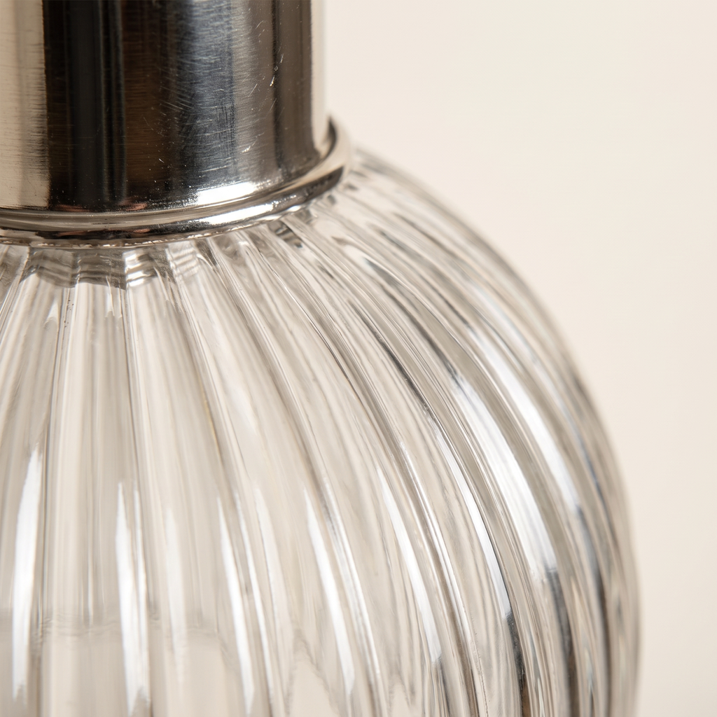 Close detail of the ribbed fluted glass and bright nickel collar of the Sereno pendant