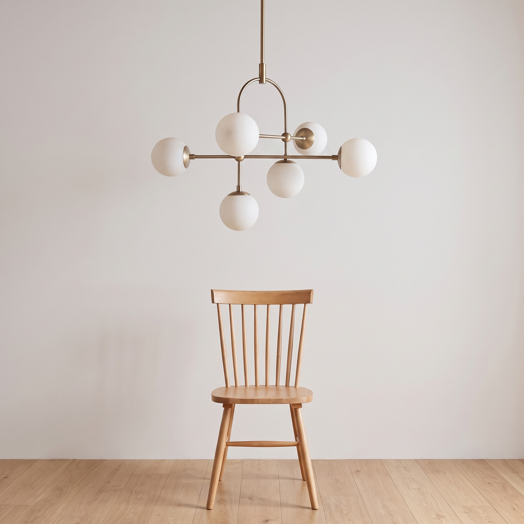 Aurelle chandelier shown above a dining chair for size reference