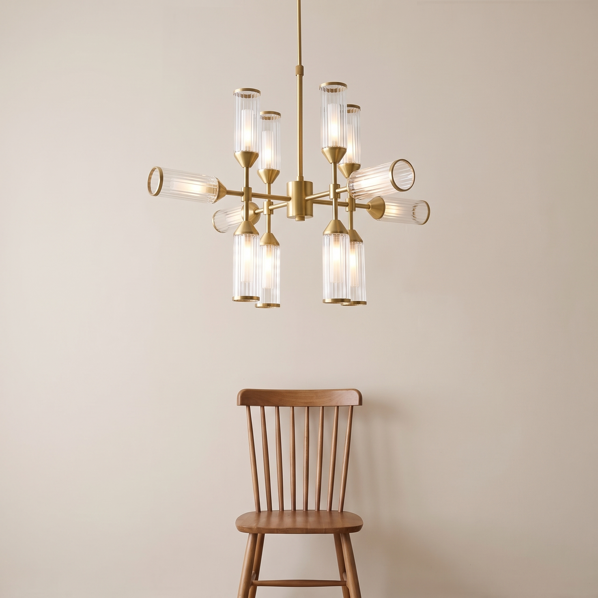 Regmont chandelier shown above a dining chair for size reference
