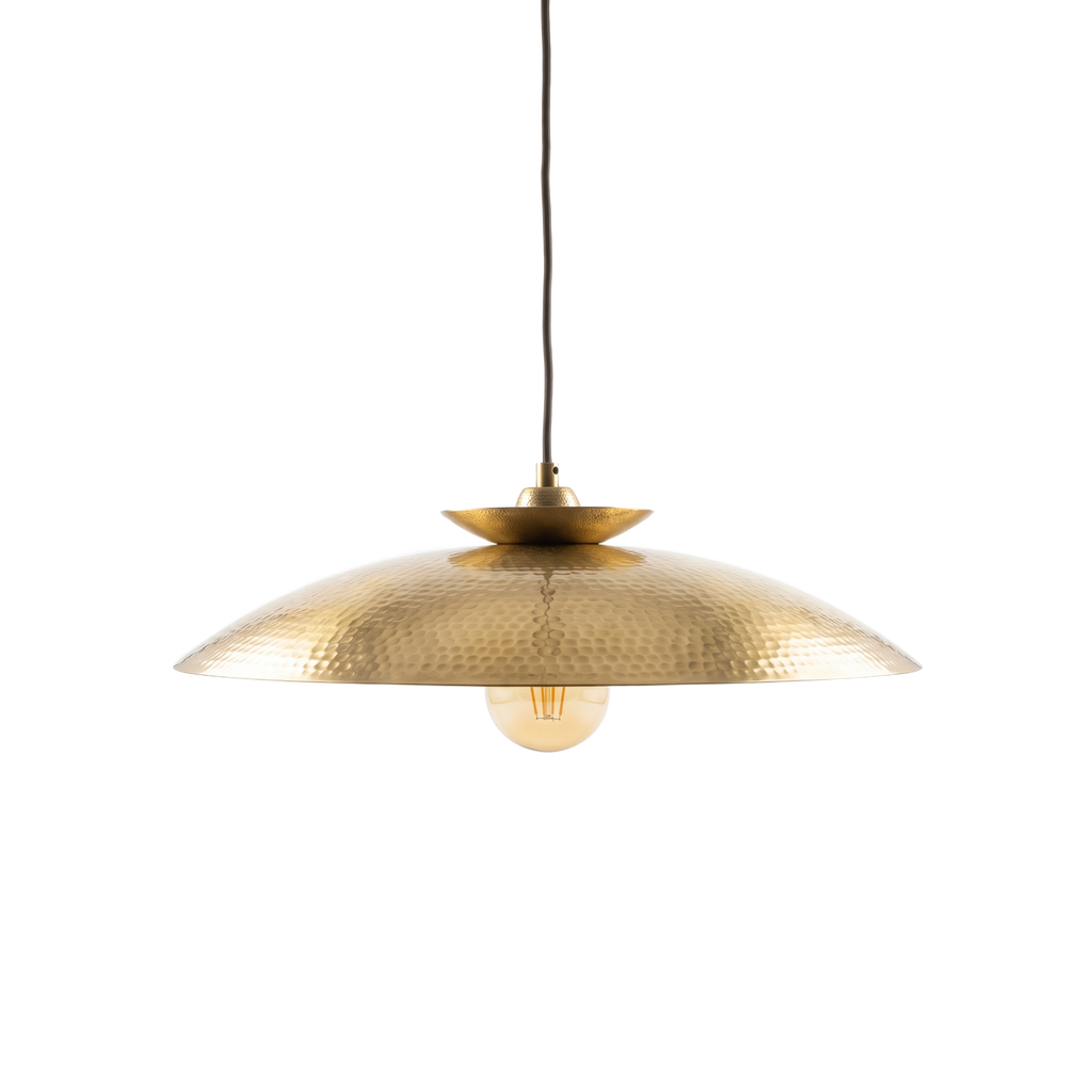 Halvern hammered brass disc pendant light on a white background