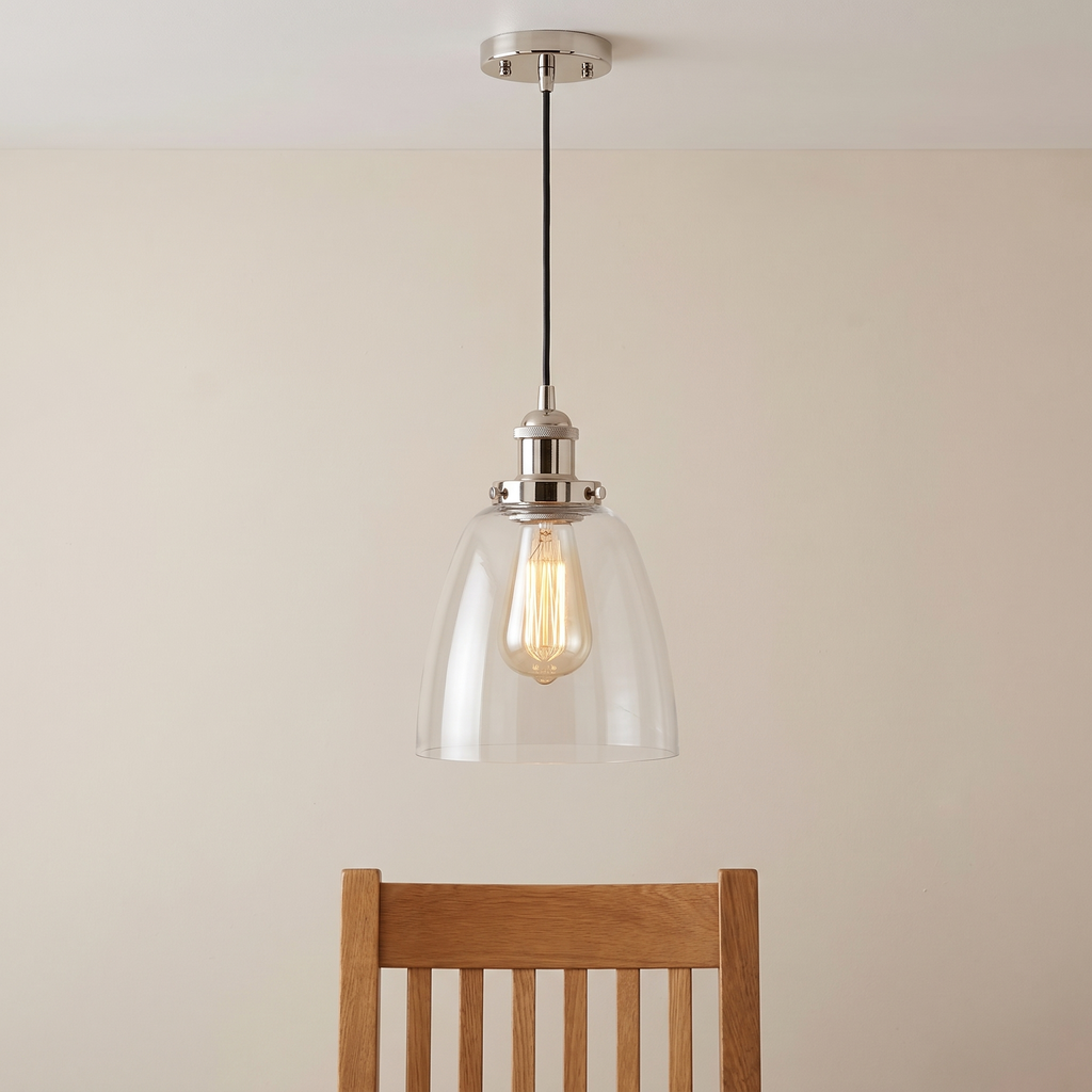 Calvara pendant light shown above a dining chair for size reference