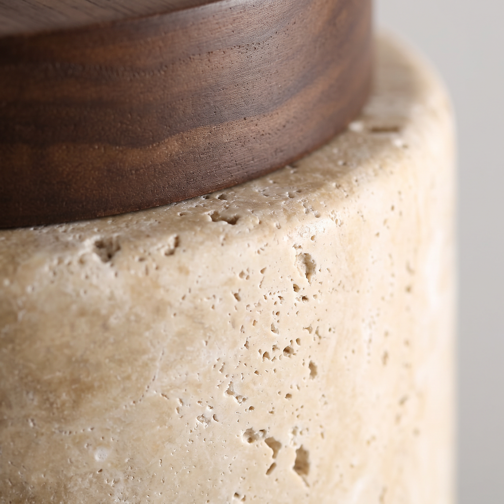 Close up of travertine stone and walnut base