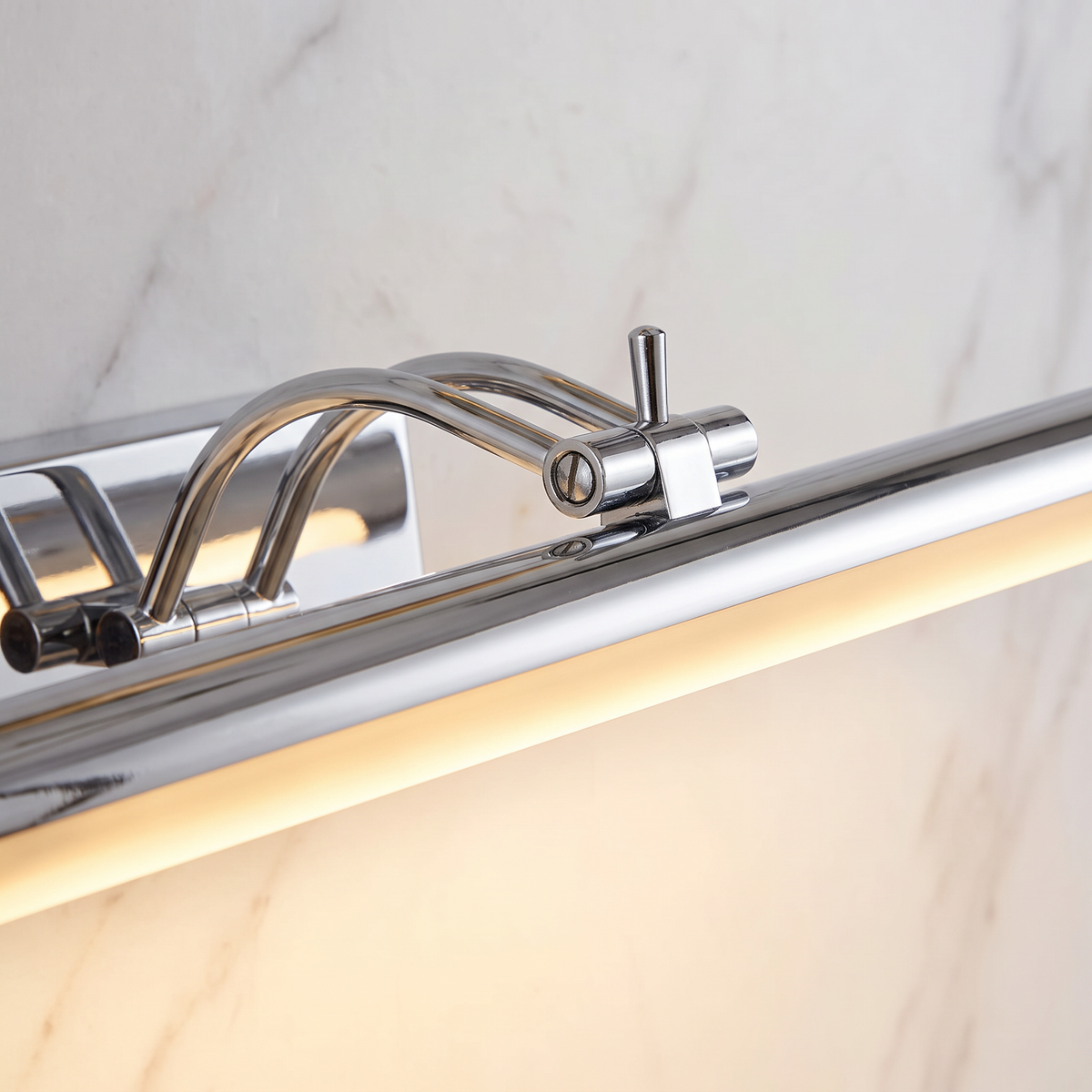 Close up of the chrome arm and glowing light bar