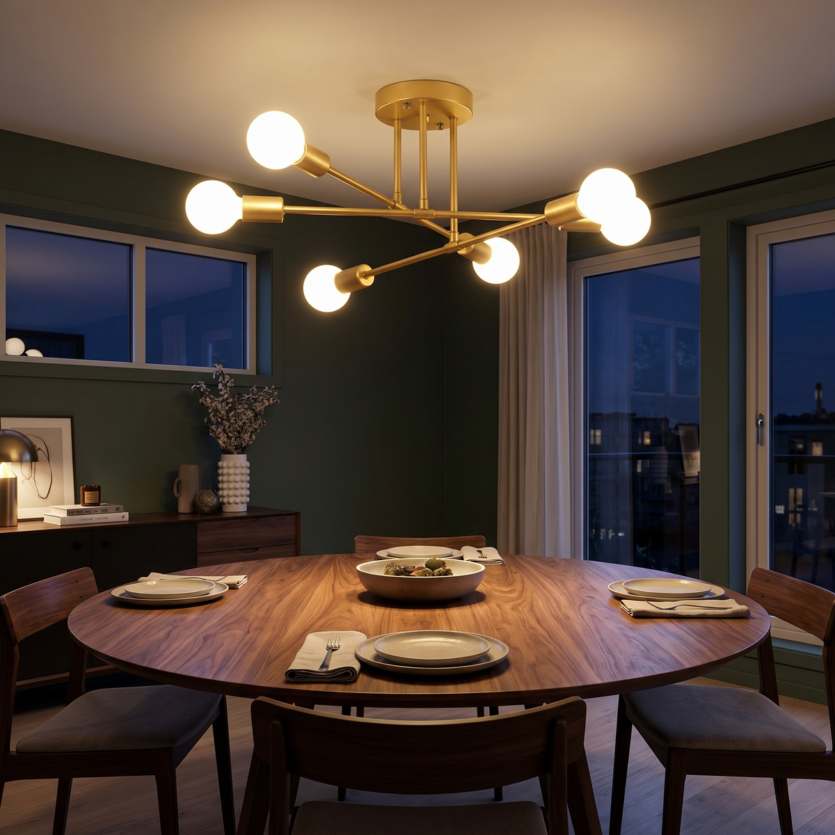 Solenne sputnik ceiling light lit above a round dining table