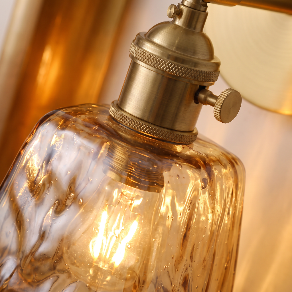 Close up of the rippled amber glass and brass holder