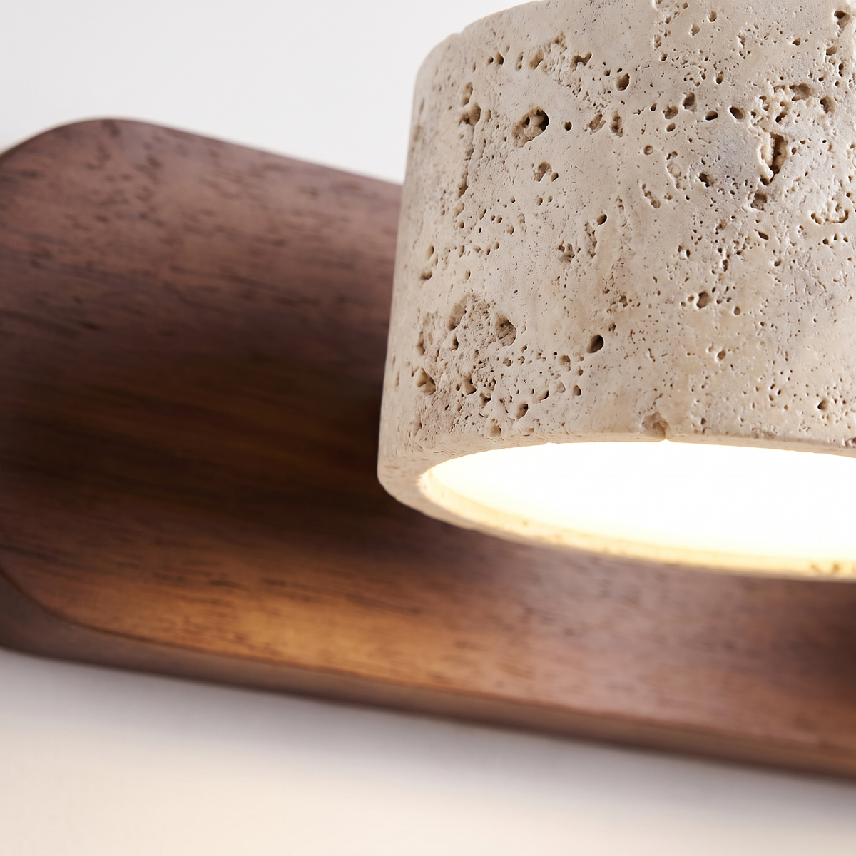 Close up of the travertine head and walnut back plate