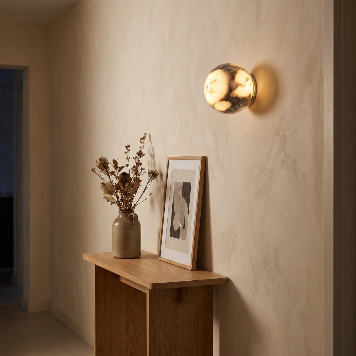 Ashby marble wall light in a cream hallway