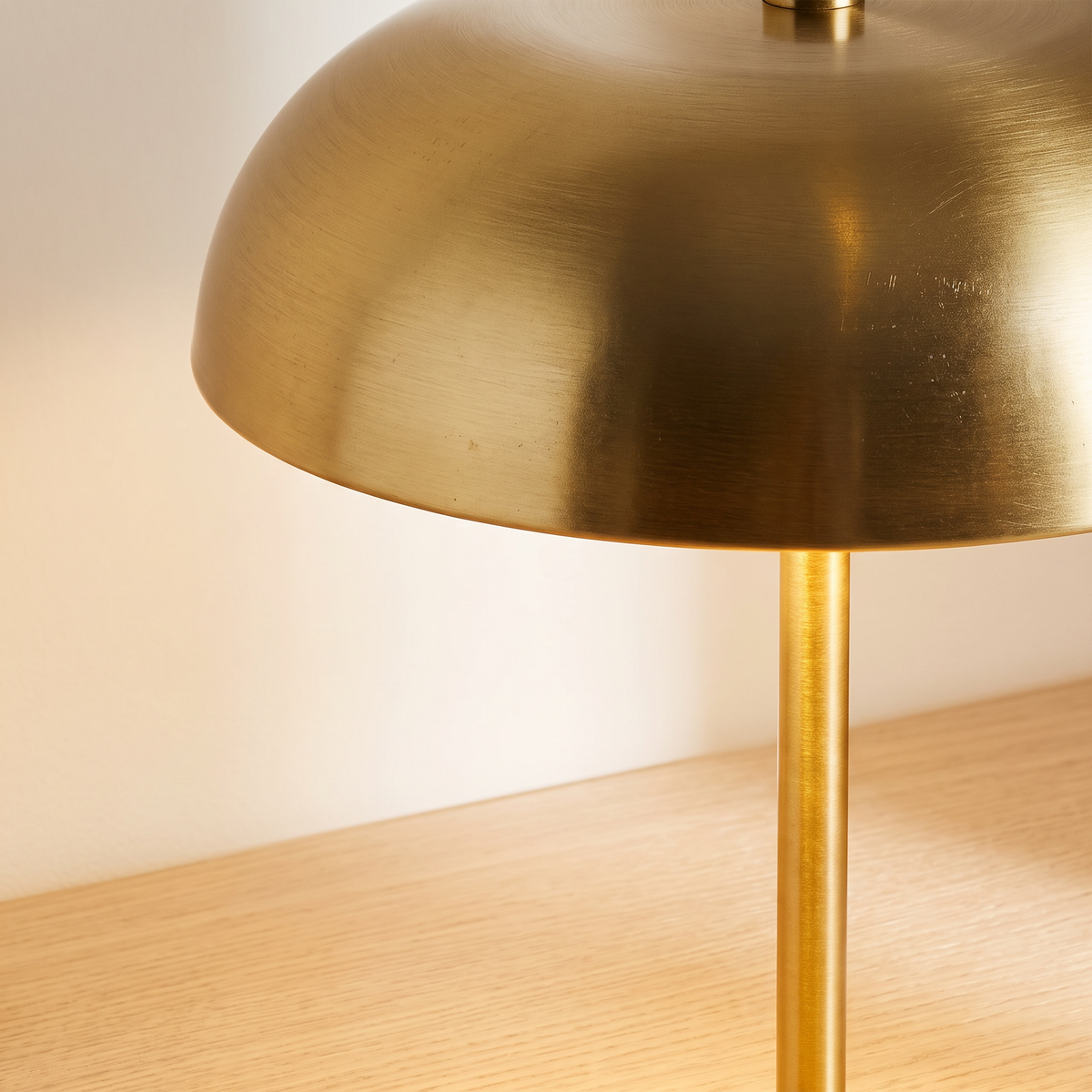 Close up of the brushed gold dome shade