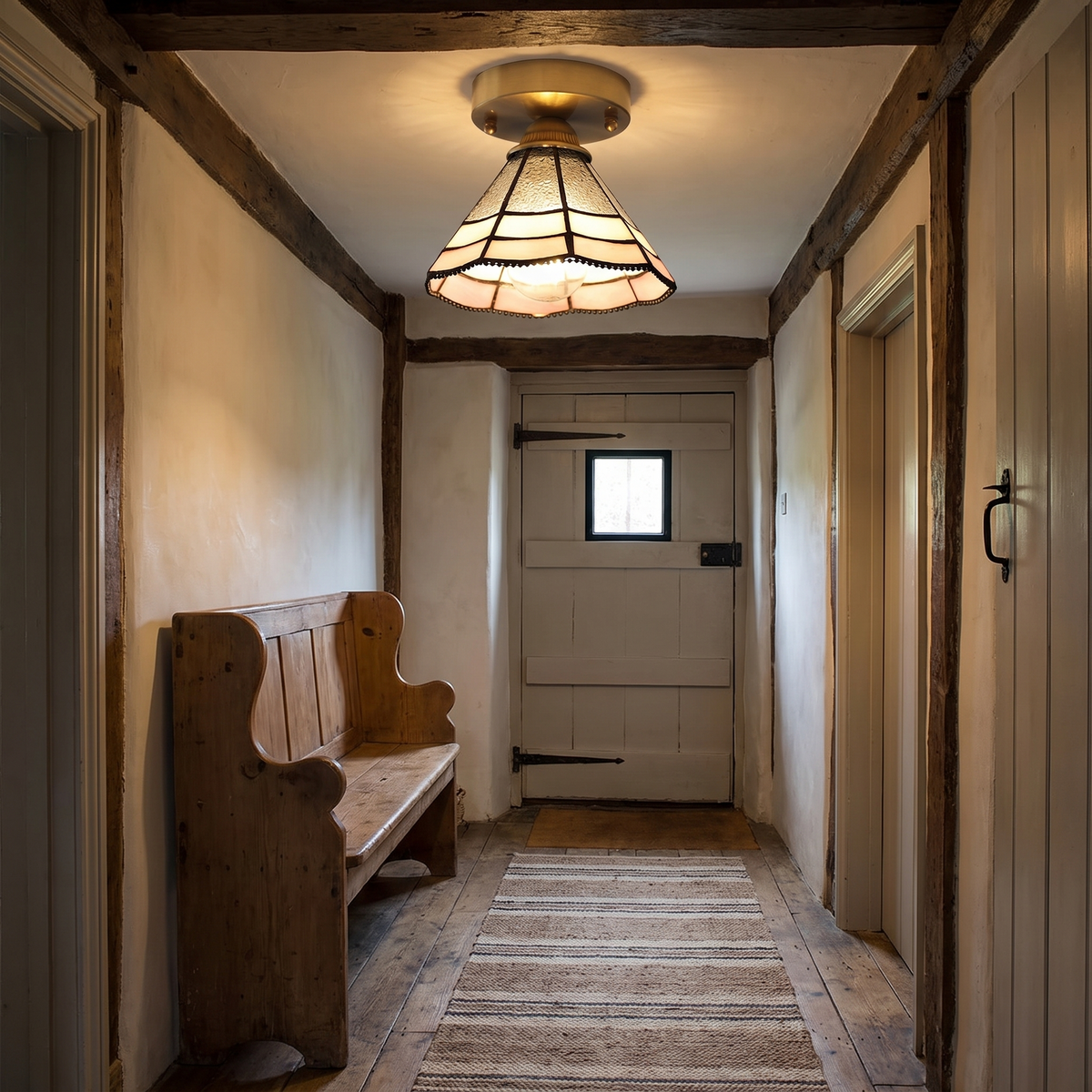Orford stained glass flush ceiling light glowing in a cottage hallway with a beamed ceiling