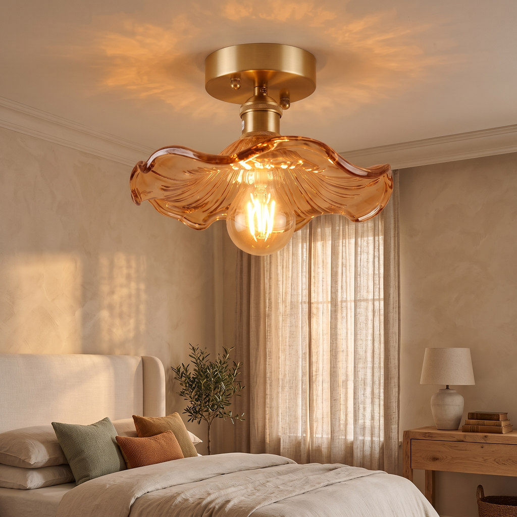 Amber Framlingham lotus leaf ceiling light glowing on a bedroom ceiling