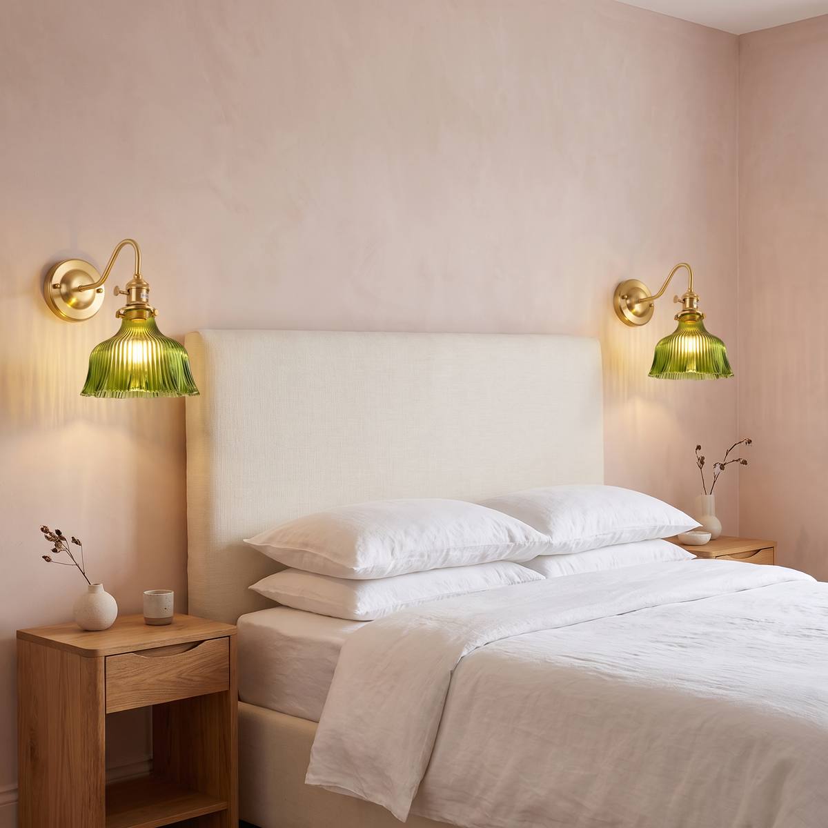 A pair of green Nayland fluted glass wall lights lit either side of a bed