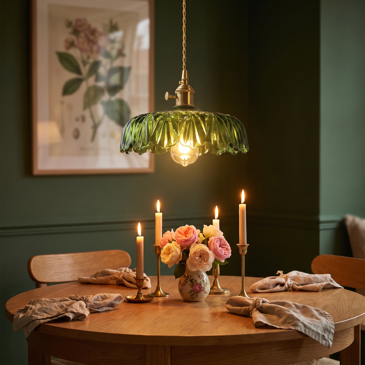 A lit Kettleburgh green ruffled glass pendant over a round dining table