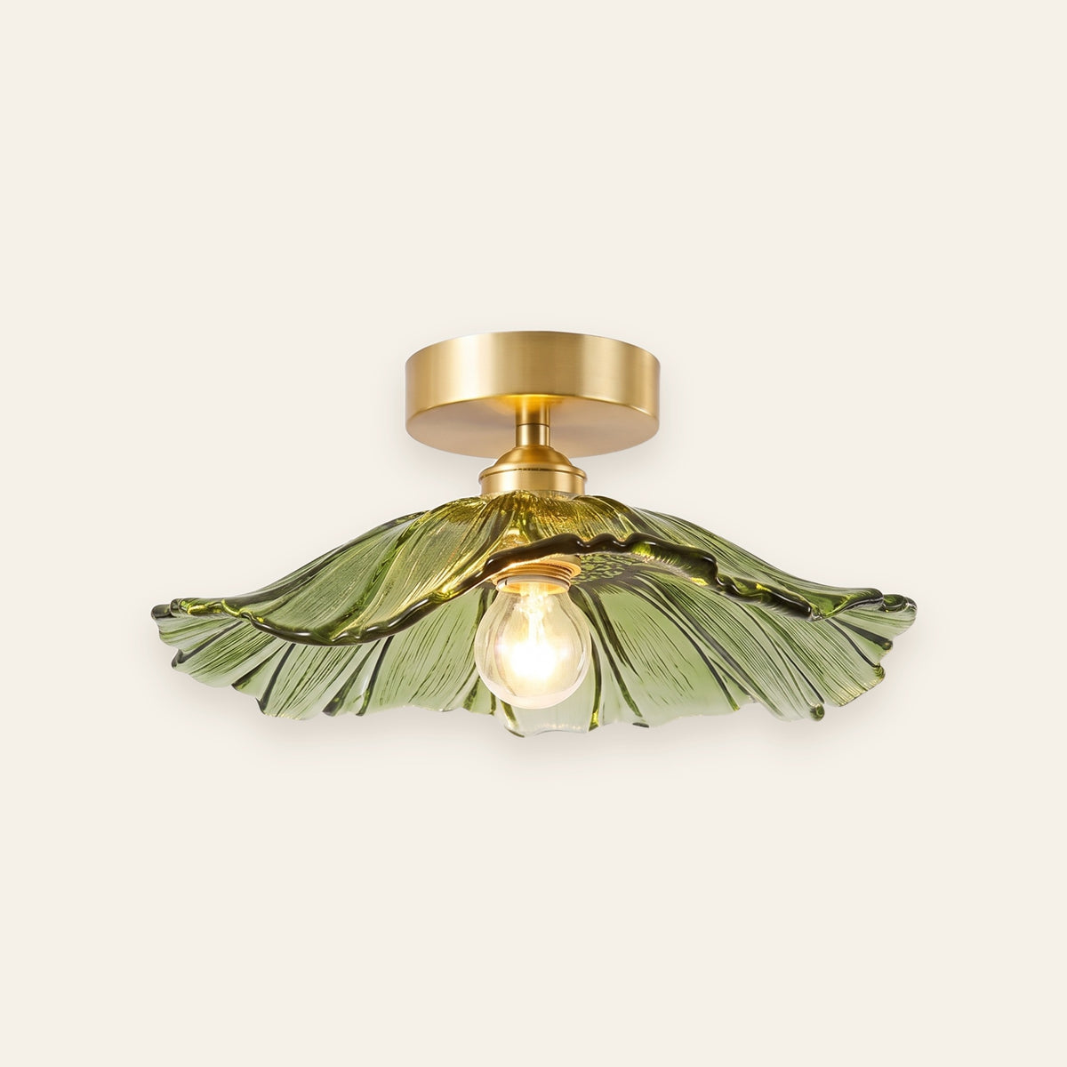 Larkin green petal glass ceiling light with brass canopy, cream background