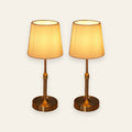 Linford rechargeable pleated table lamps with gold bases, set of two, cream background