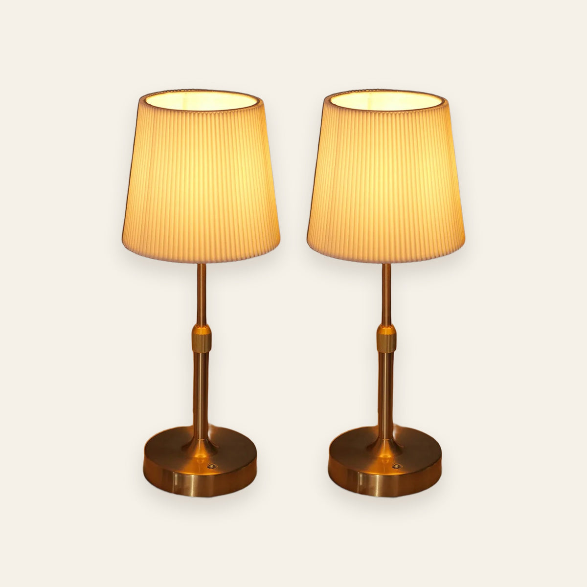 Linford rechargeable pleated table lamps with gold bases, set of two, cream background
