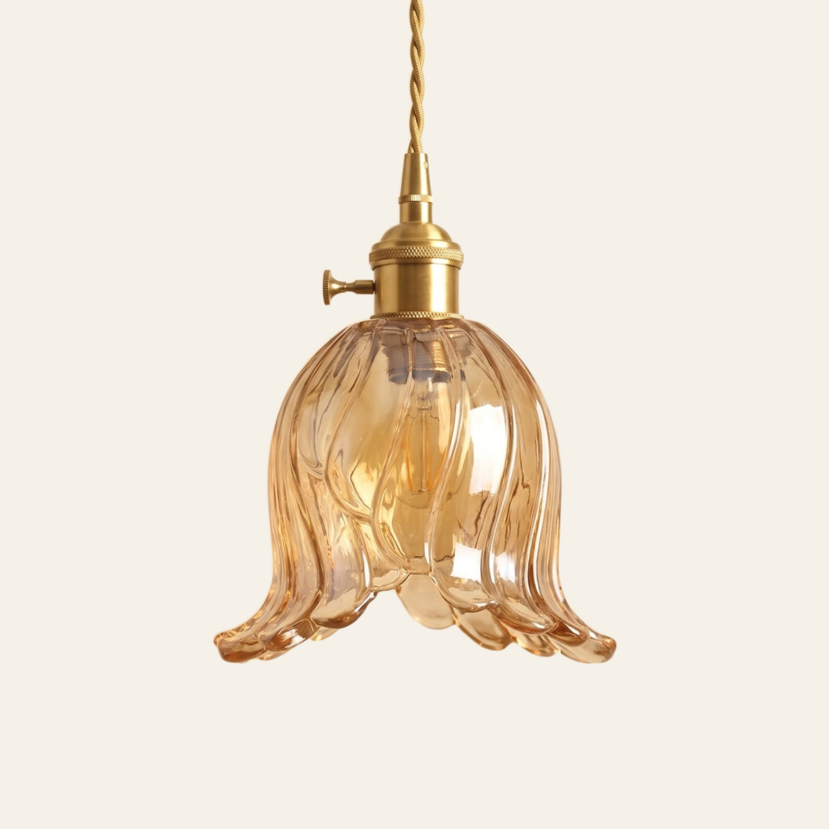 Metfield tulip glass pendant light in amber, cream background