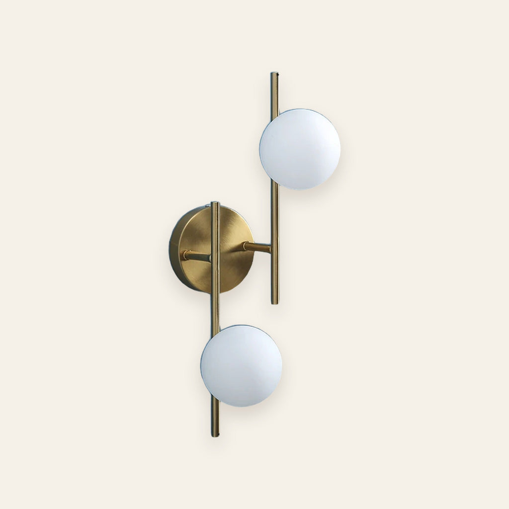 Orsett double opal globe wall light in brushed gold, cream background