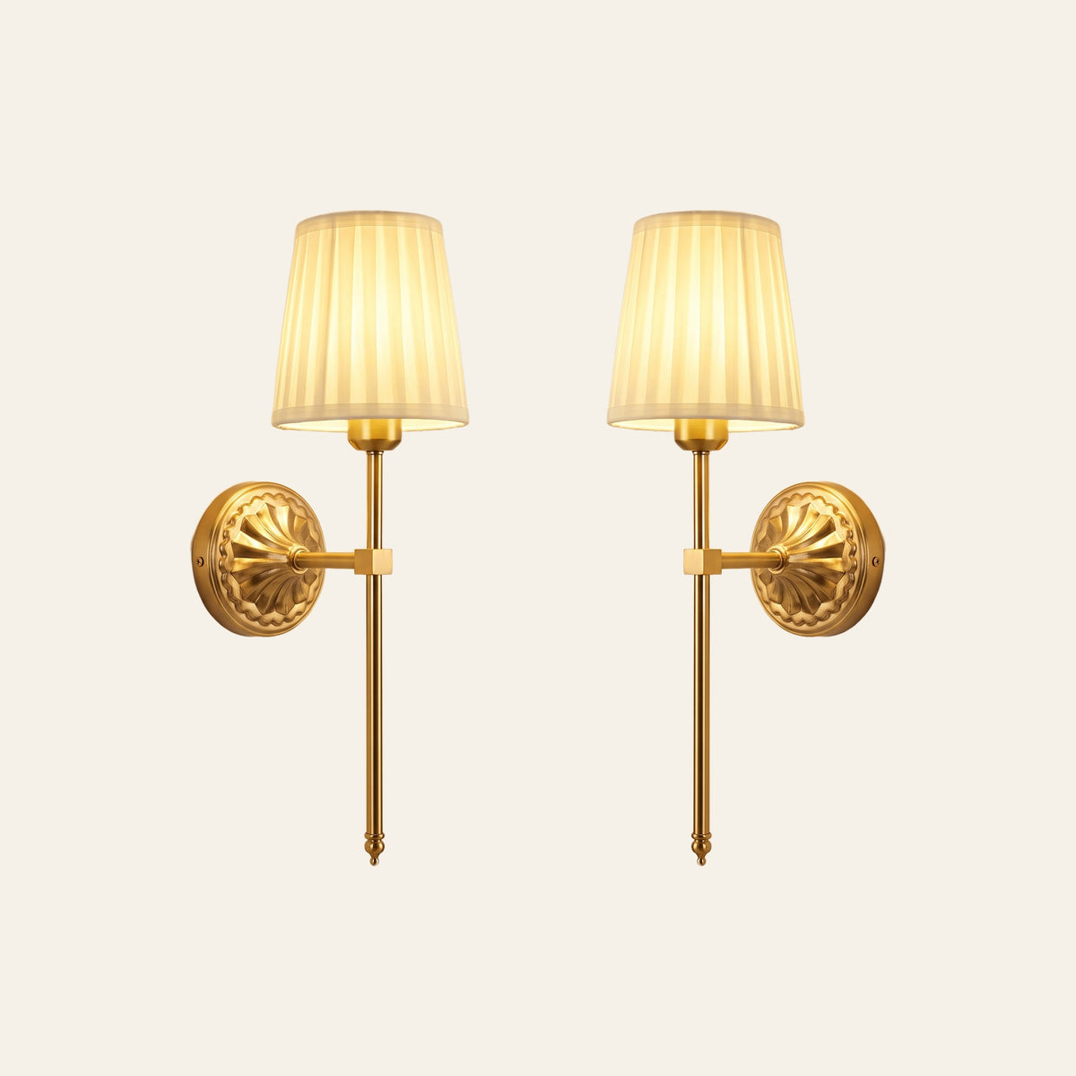 A pair of Palgrave rechargeable wall lights with cream pleated shades, lit, cream background