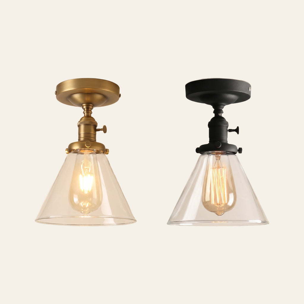 The Shotley ceiling light in antique brass and in black side by side