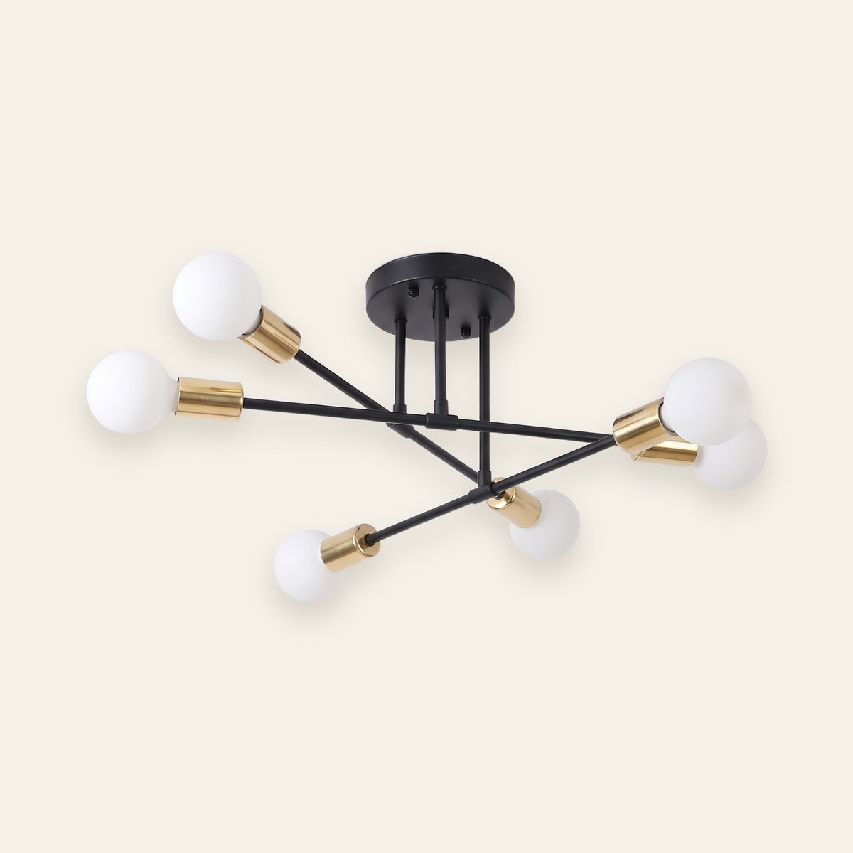 Solenne six light sputnik ceiling light in black with gold lamp holders on a cream background