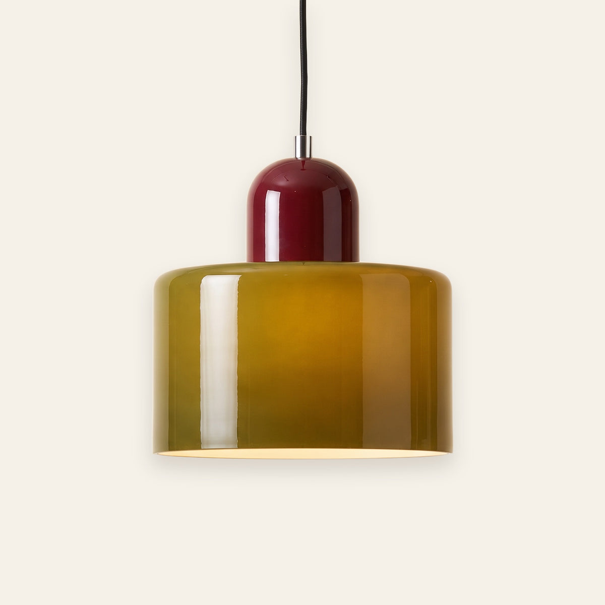 Thaxted mid century glass drum pendant light, glossy olive glass with a wine red cap, on a cream background