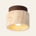 Tivoli travertine flush ceiling light on a walnut base, cream background