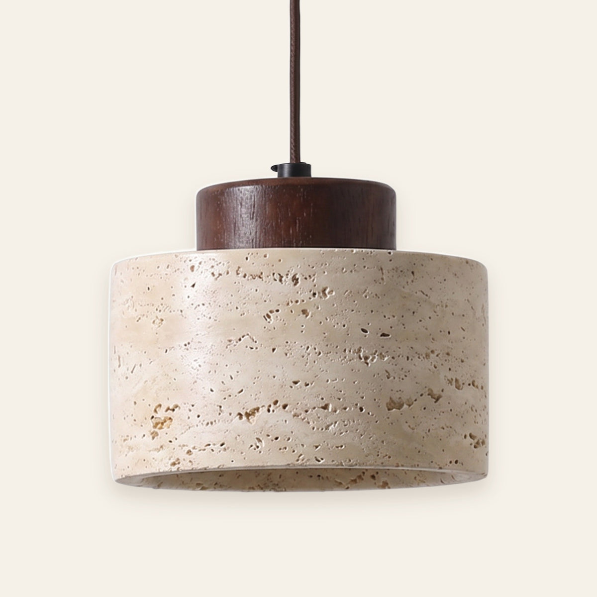 Tivoli travertine stone pendant light with walnut crown on a cream background