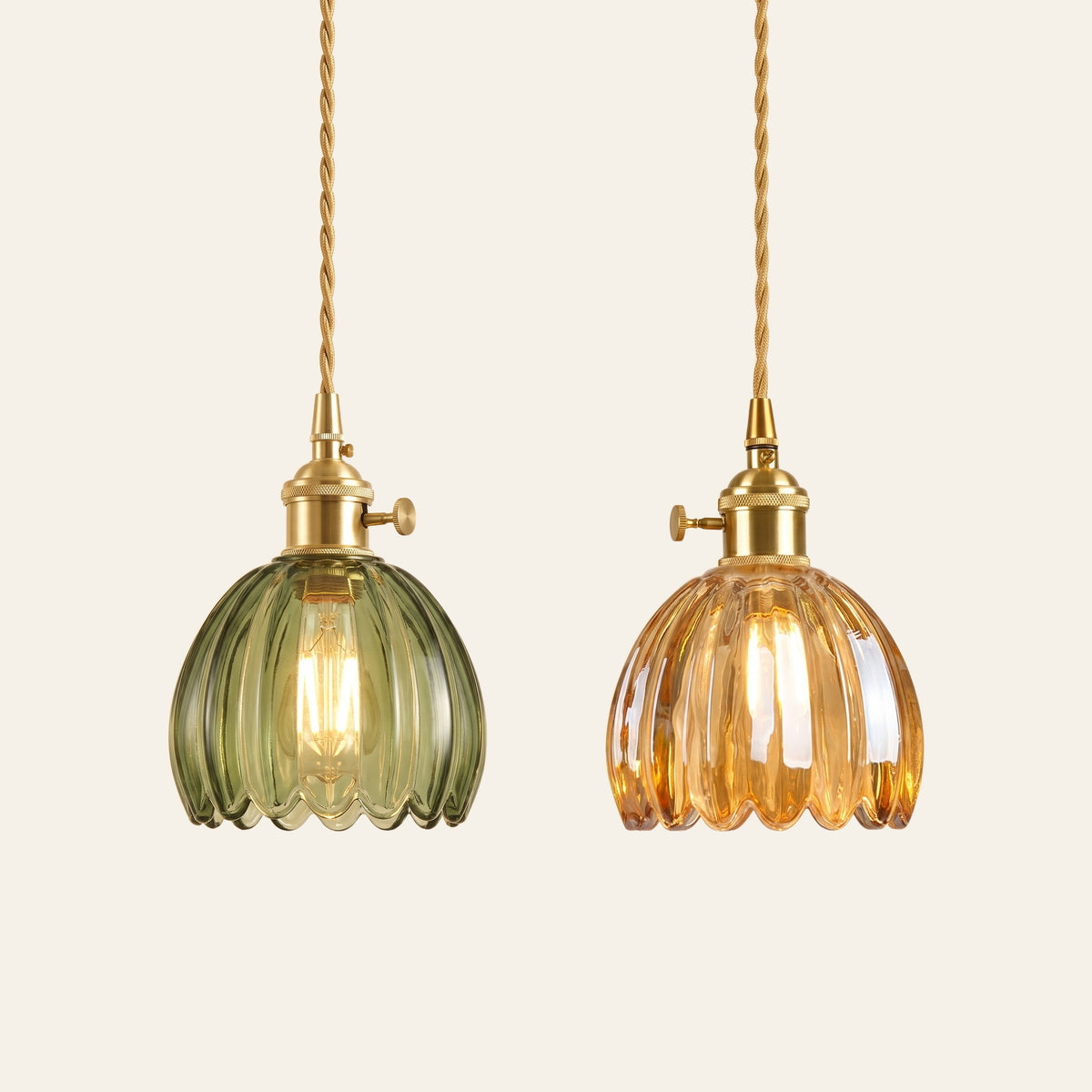 Ufford ribbed glass bud pendant lights in green and amber side by side