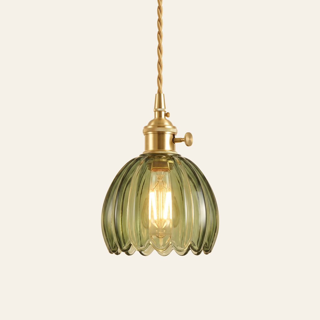 Ufford ribbed glass bud pendant light in sage green glass on a brass holder with a twisted cord, cream background