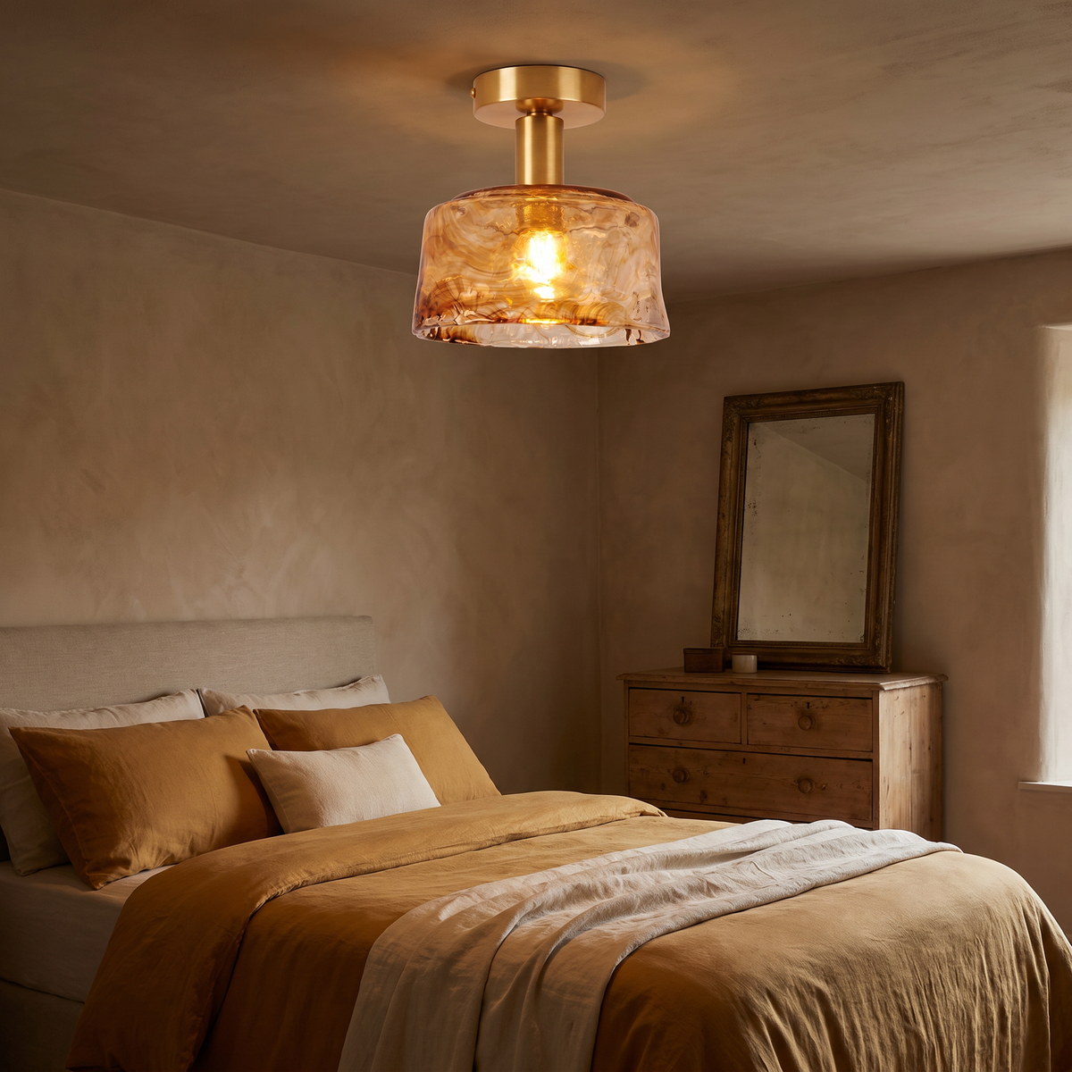 A lit Walpole marbled amber semi flush ceiling light in a bedroom with a low ceiling