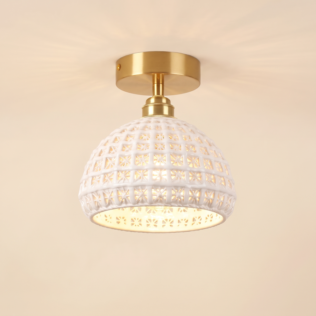 Wangford semi flush ceiling light with a white ceramic basket weave dome on a short brass fitting, cream background