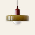 Welwyn mid century glass pendant light, olive glass disc with a burgundy cap, on a cream background