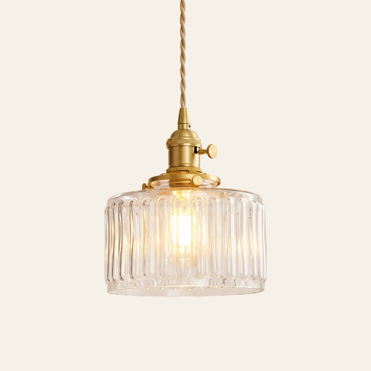 Wenhaston pendant light in clear ribbed glass, cream background