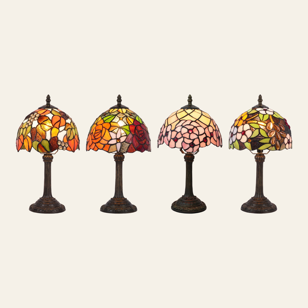 The Woolpit stained glass table lamp in its four designs side by side