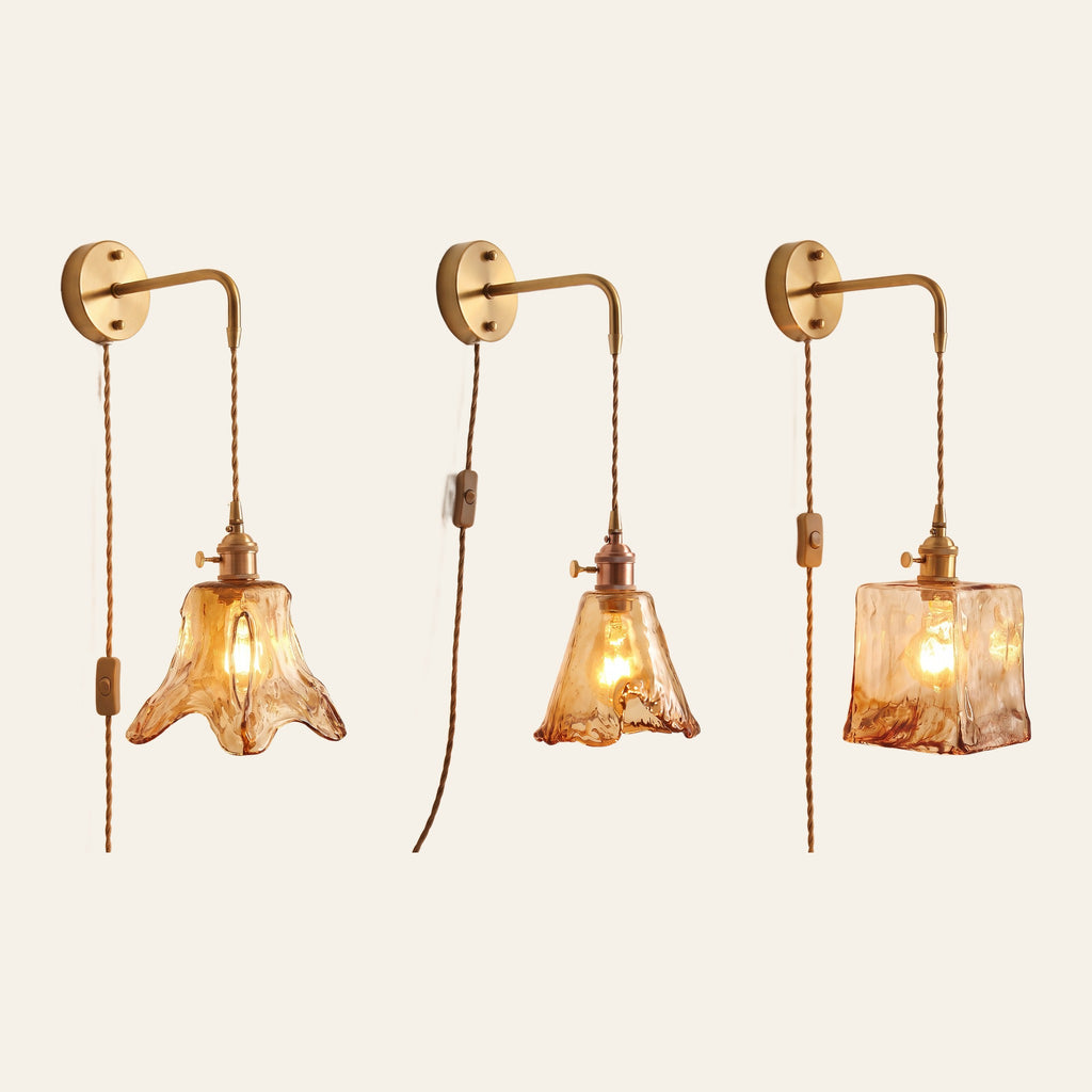 The Yaxley wall light with the lily, tulip and square amber glass shades side by side