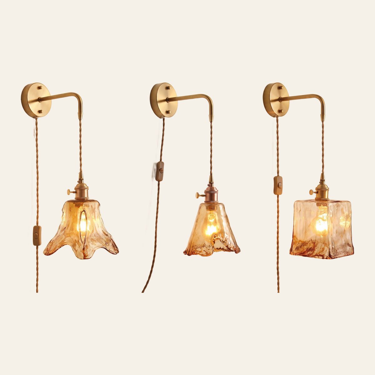 The Yaxley wall light with the lily, tulip and square amber glass shades side by side